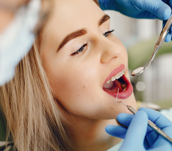 patient in dental chair in jackson heights queens